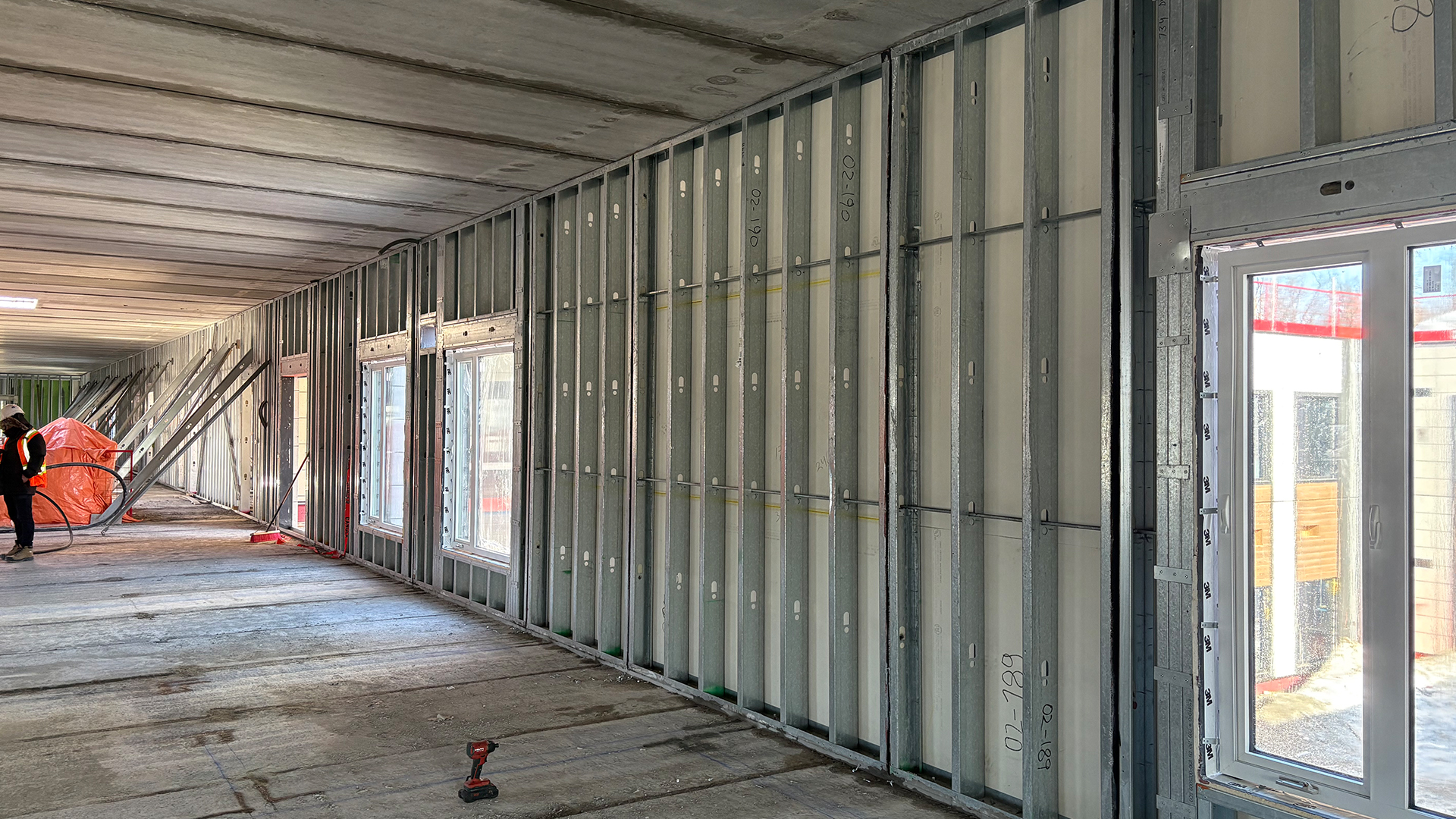 A photo from a construction site setting up the foundation of the Arcavia Long Term Care facility in Orillia Ontario, consulted by BlueGrid Engineering.